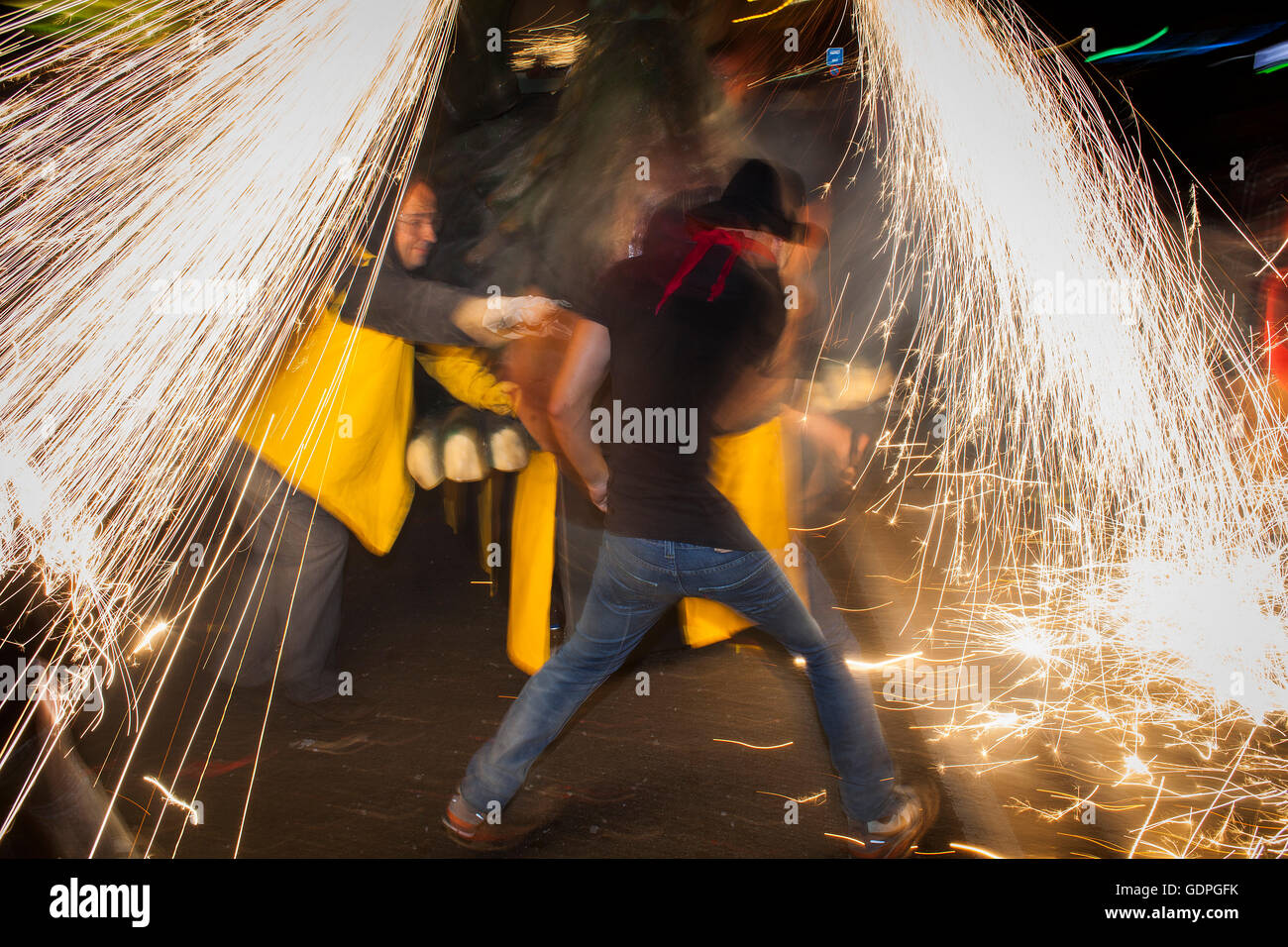 `Correfoc´, typical catalan celebration in which dragons and devils armed with fireworks dance through the streets. In Via Laiet Stock Photo